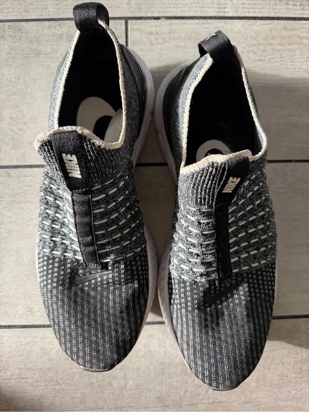 Nike Black and White Knit Slip-On Sneakers